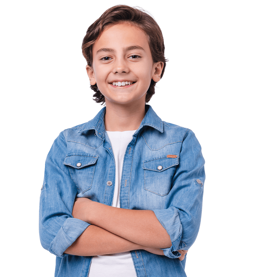 Young Boy Smiling With Arms Crossed