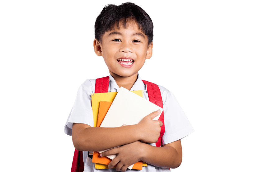 Young Boy With Books Smiling