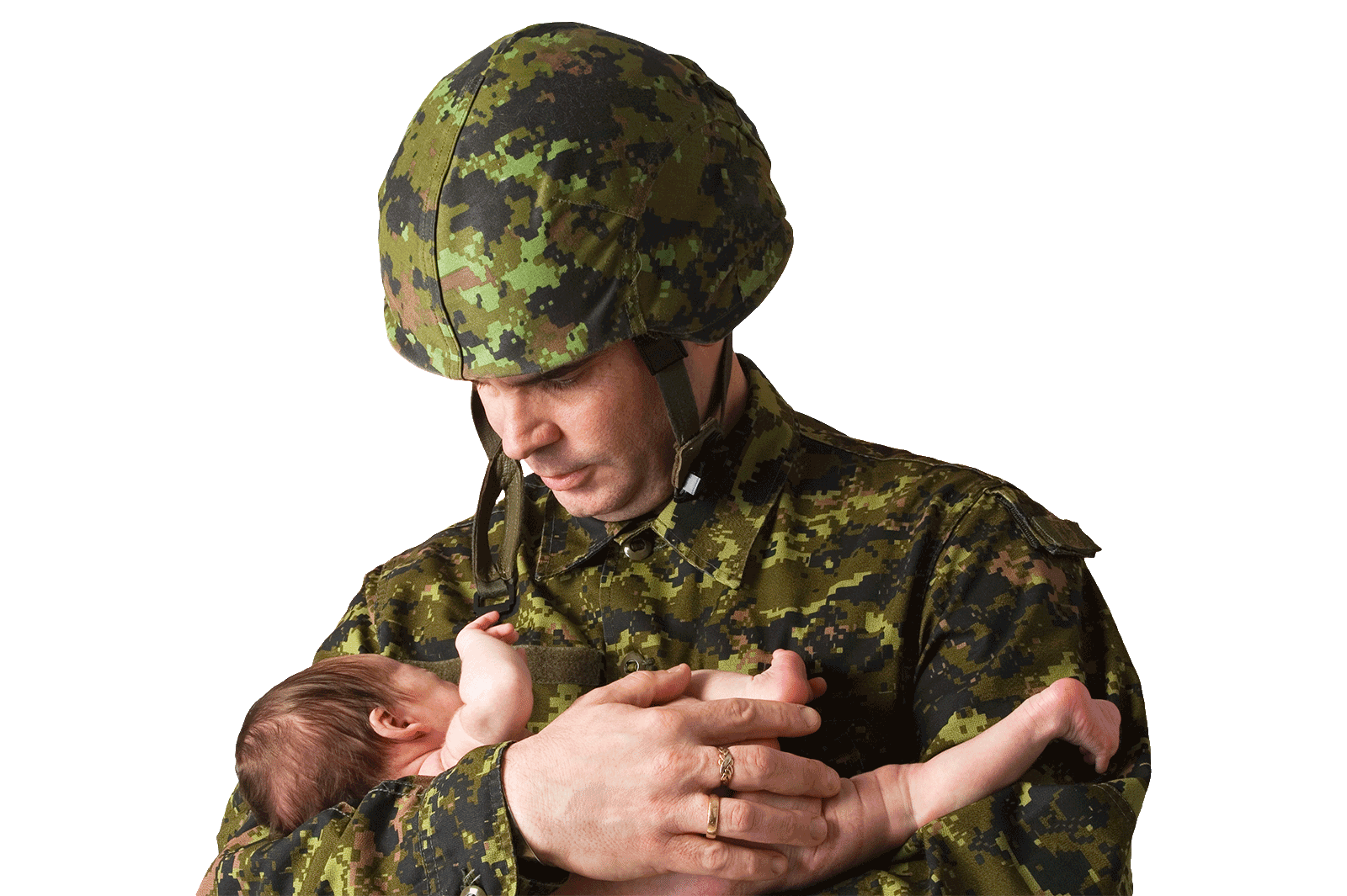 Canadian soldier holding a baby