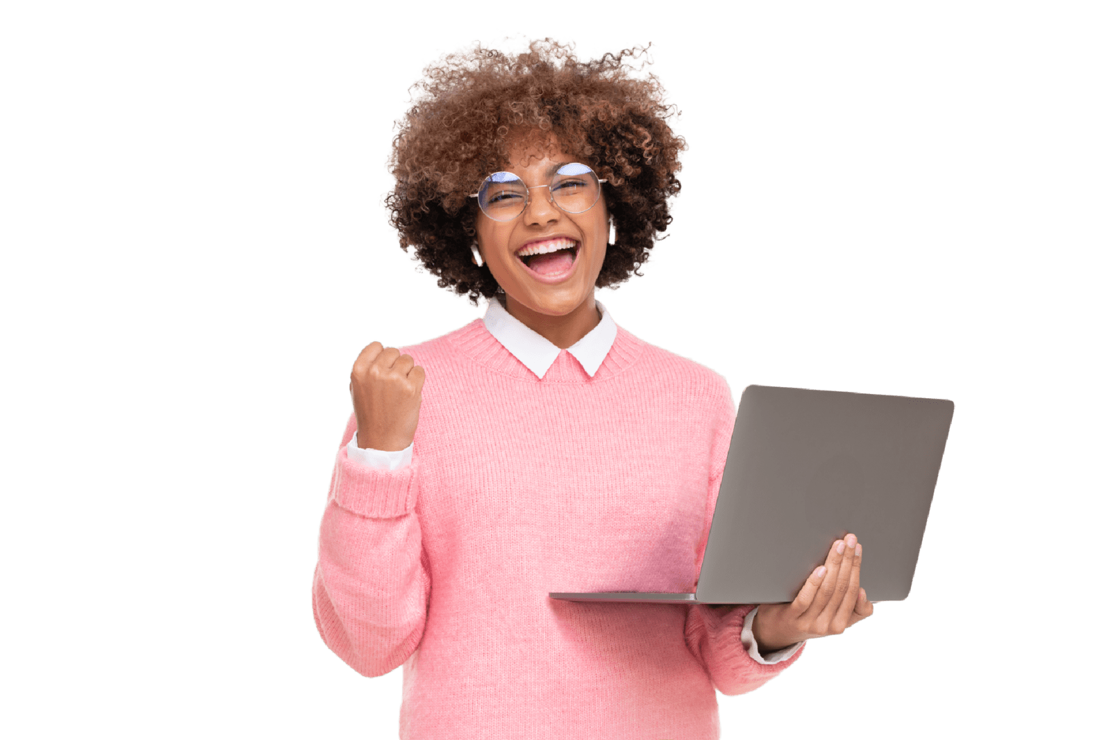 Girl holding a laptop smiling pumping her fist