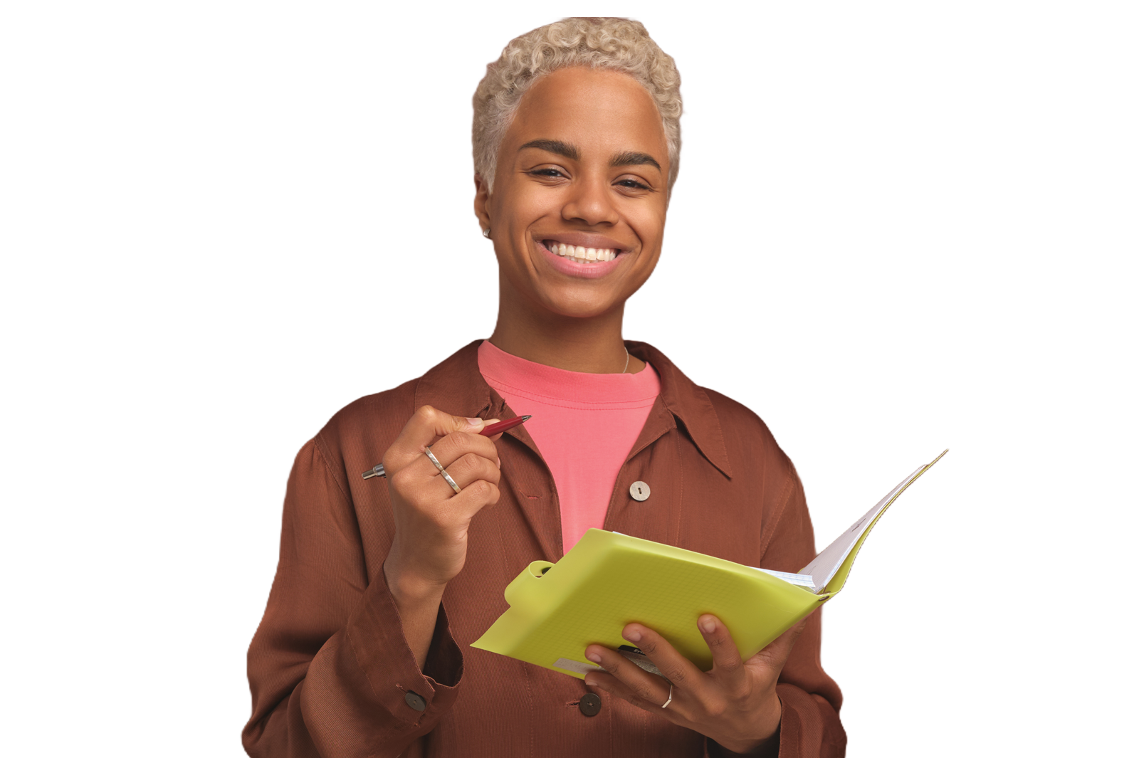 Teacher smiling while holding a book