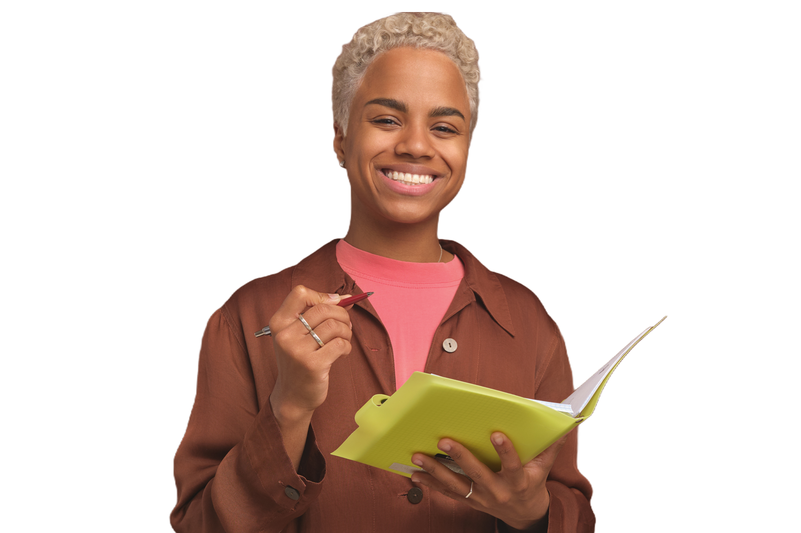 Teacher smiling while holding a book