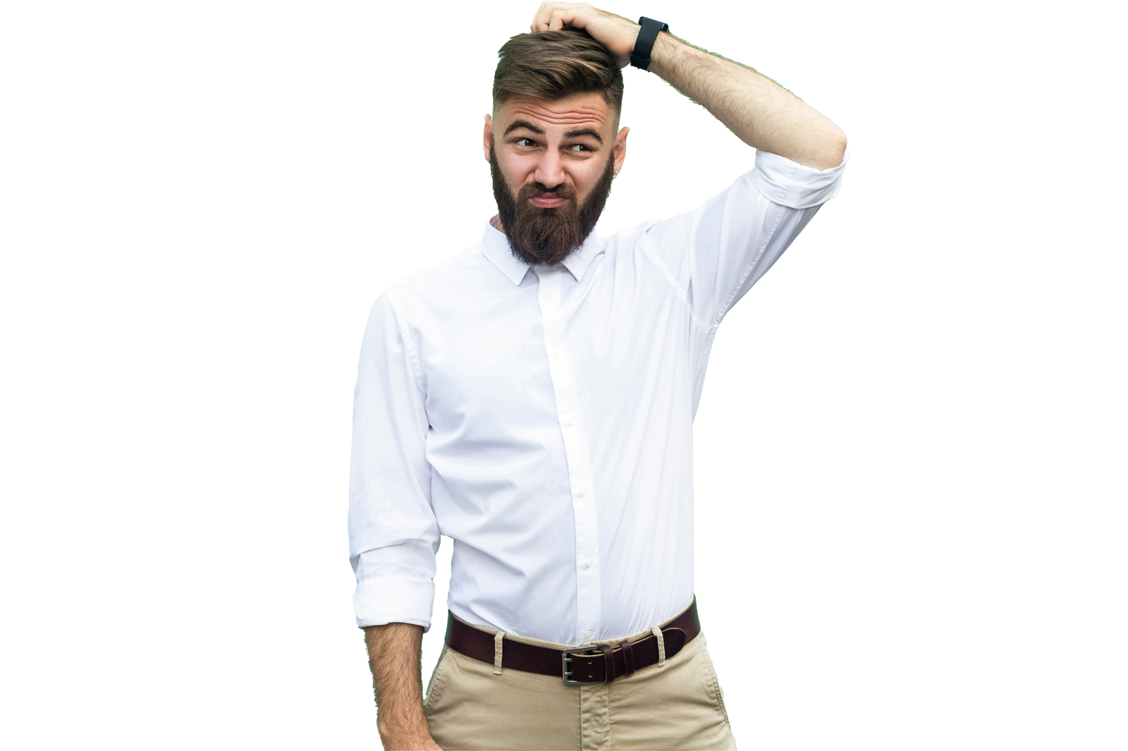 A man with a beard, wearing a white shirt and beige pants, playfully scratching his head and smirking