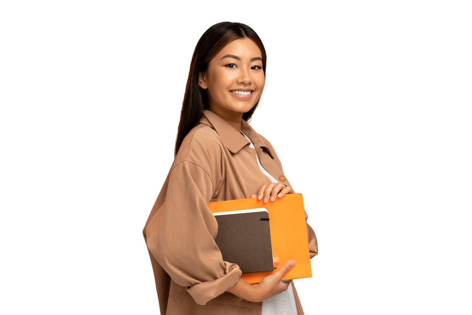 Student holding manila envelope and book smiling