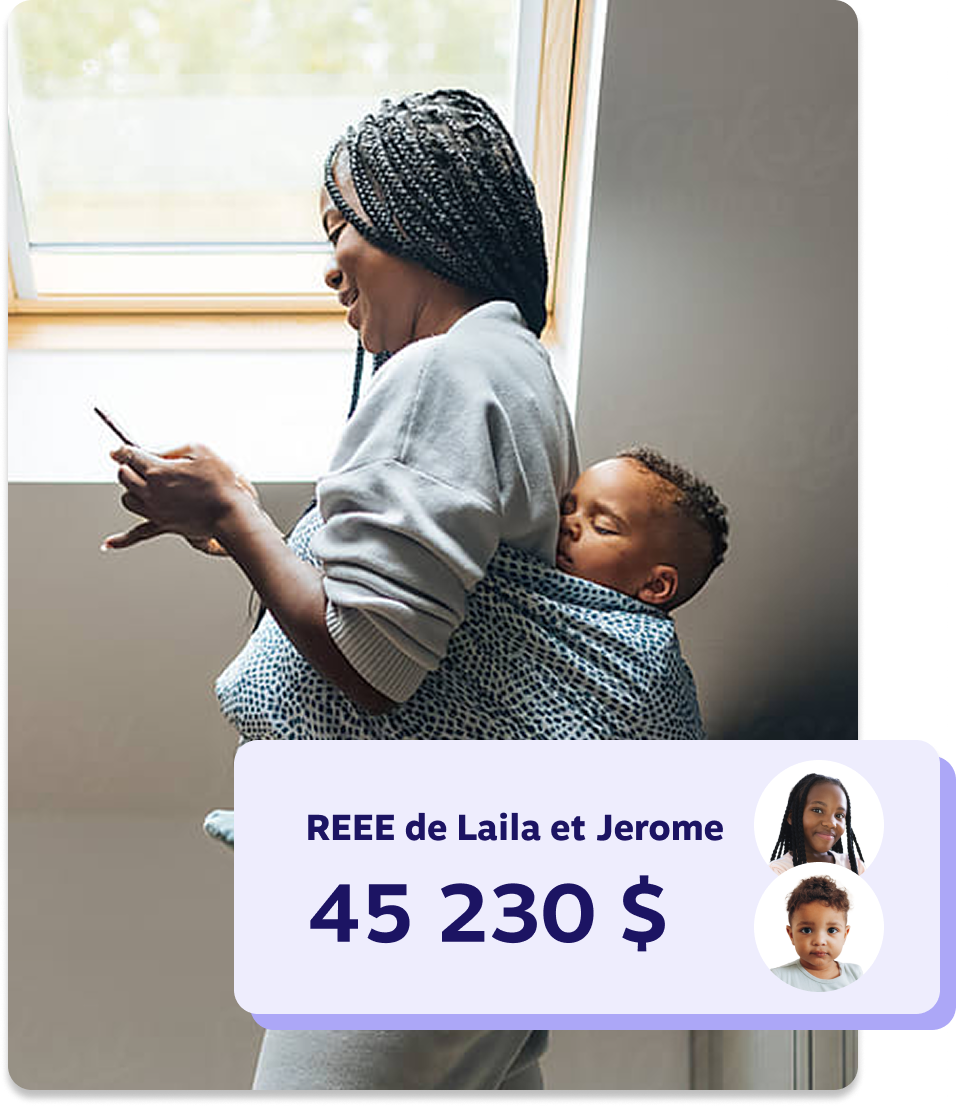 Jeune mère au téléphone avec son bébé attaché contre elle